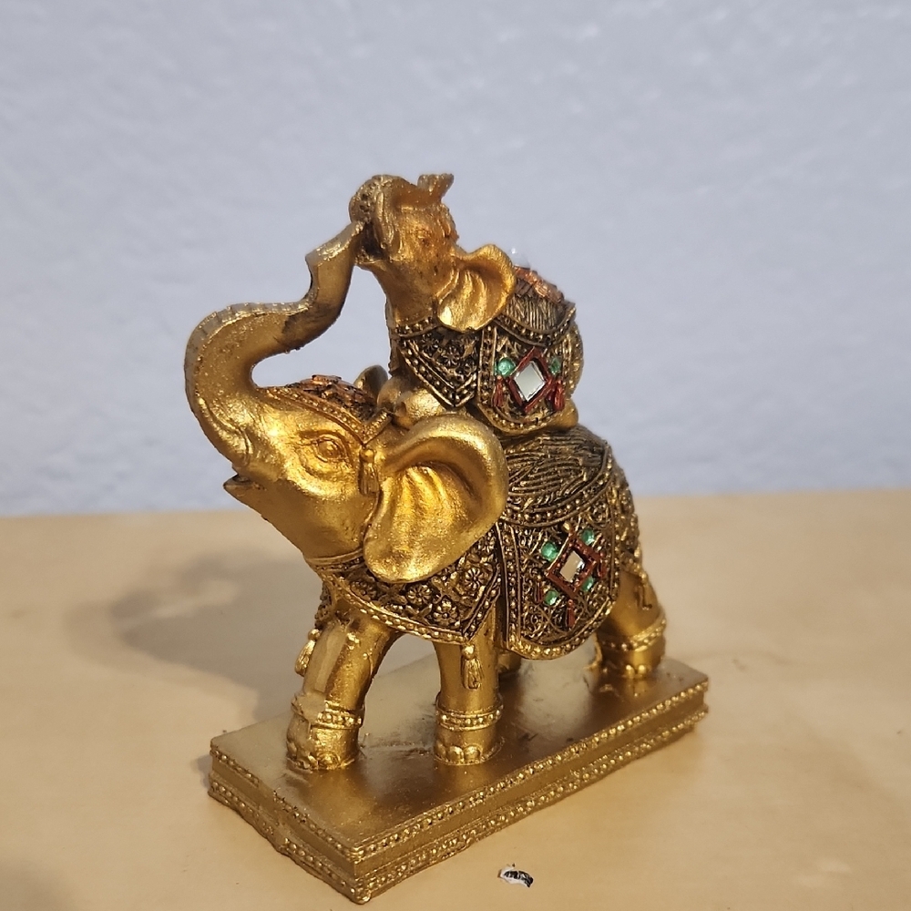 Elegant Gold Elephant Figurine with Colorful Accents
